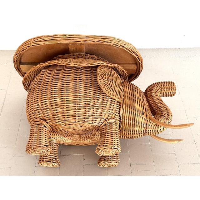 Beautiful eye-catching woven wicker side table with tray top. made in italy by vivai del sud, 1970-1980s. this elephant...