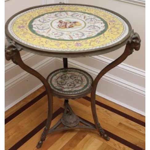A beautifully crafted French-style gueridon side table showcasing timeless elegance and exceptional decorative detail. The...