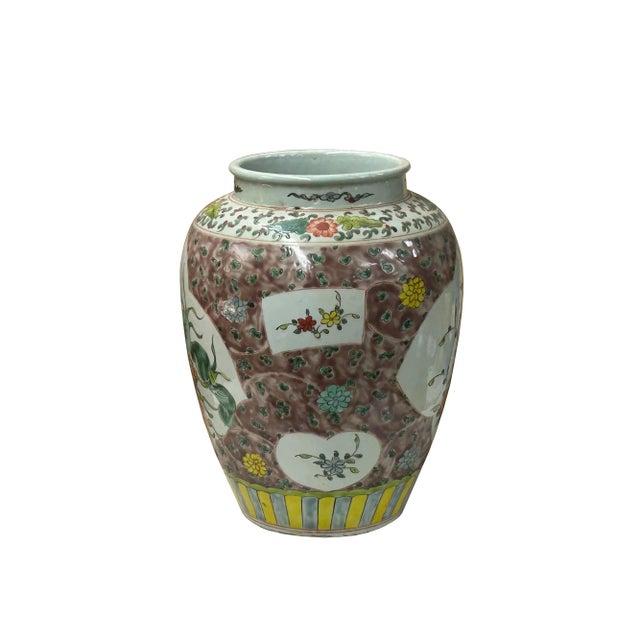 This handmade Chinese porcelain vase showcases exquisite hand-painted artwork on both sides. One side features serene...