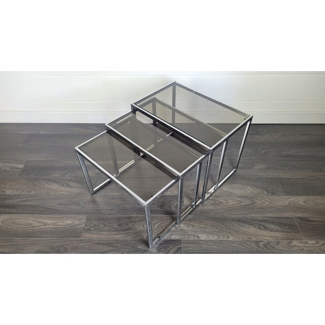 MDA Nesting Tables attributed to Howard Miller for Miller Design Associates, 1970s, Set of 3, in Good conditions. Designed...