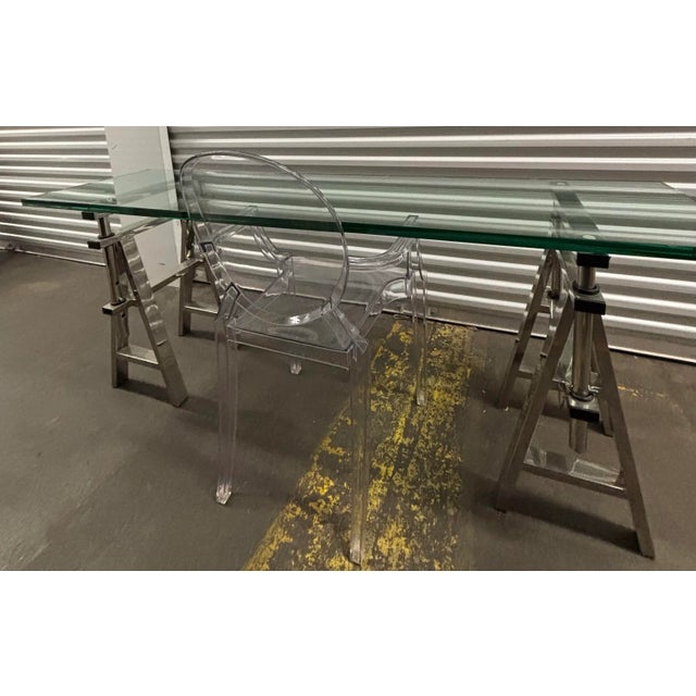 Elevate your living space with this practical console table with adjustable height that could also be used as a small...