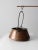 This is an antique copper kettle. The beautiful, heavy copper pot has an iron handle with a ring that was used to hang...