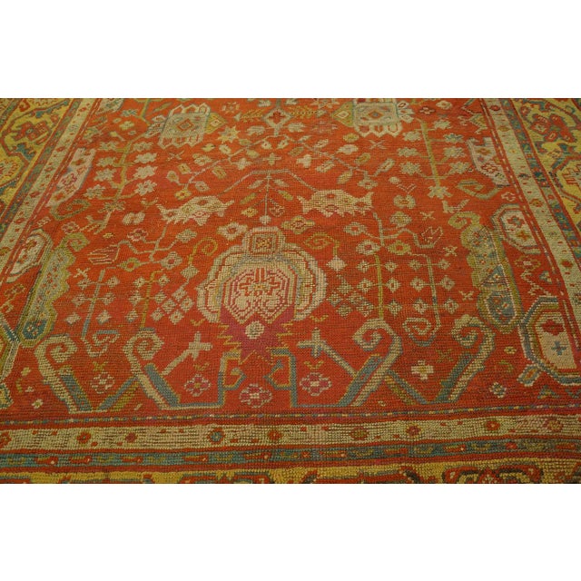 Impressive Coral Red With Palmettes Cross Pattern Antique Turkish Oushak Rug For Sale - Image 11 of 12