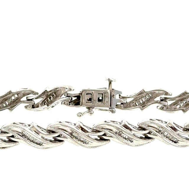 Elegant Sterling Silver 1.00ctw Diamond Baguette Tennis Bracelet Add a touch of timeless sophistication to your collection...