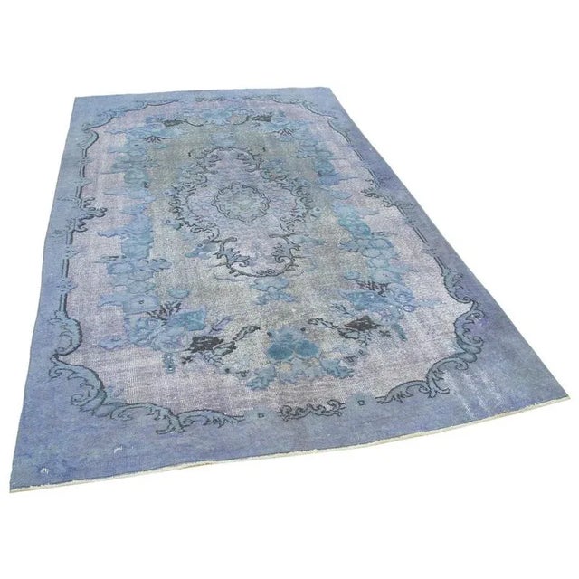 Explore our Hand-carved Over-dyed rugs, where vintage hand-knotted Turkish rugs from the 60s and 70s are given new life....