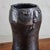 A hand-sculpted ceramic vase signed by the French ceramicists Dalo. Crafted from black iridescent glazed ceramic, the...