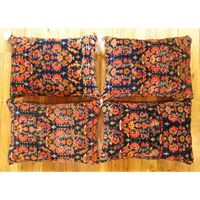 A set of Antique Persian Malayer rug pillows; size 19" x 13” each. An antique decorative pillows with geometric abstracts...