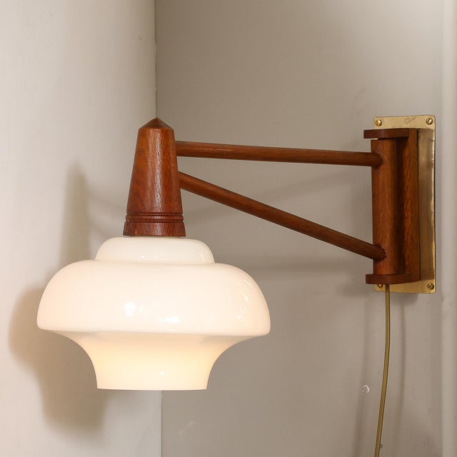 Mid-Century Modernist Milk Glass & Teak Swing Arm Wall Sconce W/ Brass Fittings For Sale - Image 4 of 12
