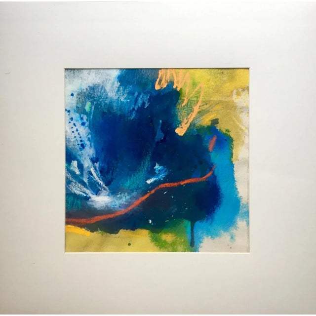 This piece is a bold abstract painting in shades of bright blues and yellows. It has bold brush strokes and expressionist...