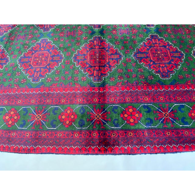 2000 - 2009 5′0″ × 7′0″ Hand-Knotted Afghan Wool Rug in Red & Green — Turkoman Tribal Design With Diamond Motifs For Sale - Image 5 of 6