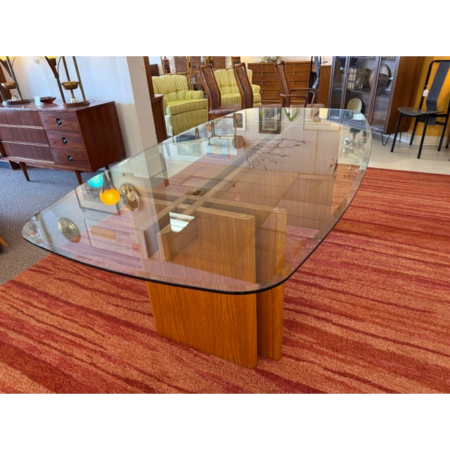 We love this Danish Modern Teak Glass Top Dining Table Designed by Gustav Gaarde and Manufactured by Trekanten in Jutland...