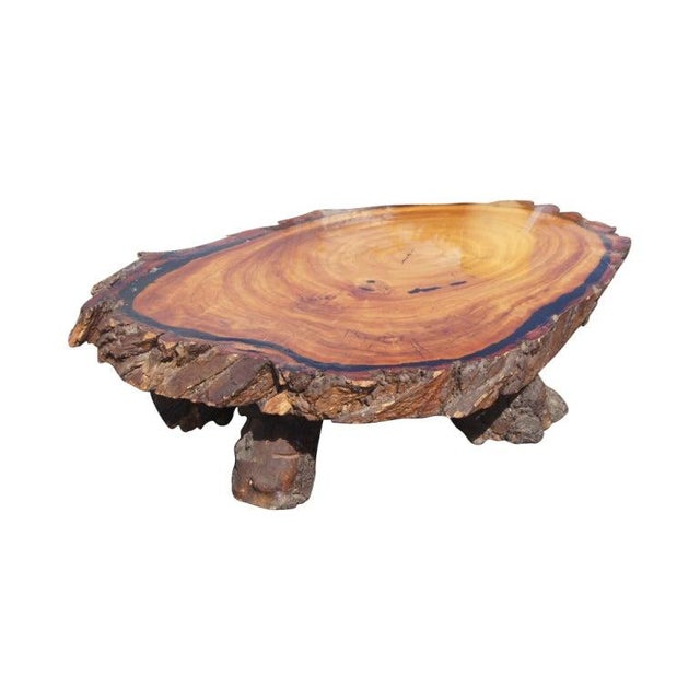 5ft Live Edge Redwood Coffee Table Constructed from a rustic redwood slab on shorter legs.