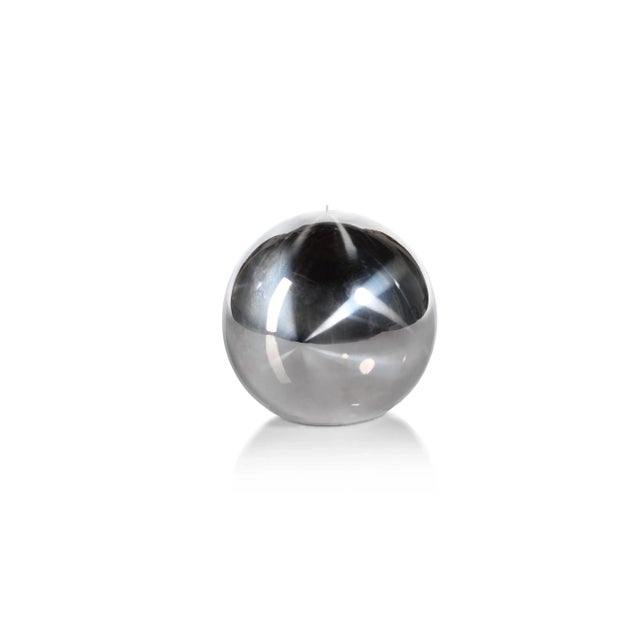 Accentuate your holiday home accessories with a contemporary Titanium Ball Candle. Silver in color with a finish top layer...