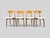 "This elegant set of four Italian dining chairs, produced during the 1960s, combines clean Scandinavian-inspired lines...