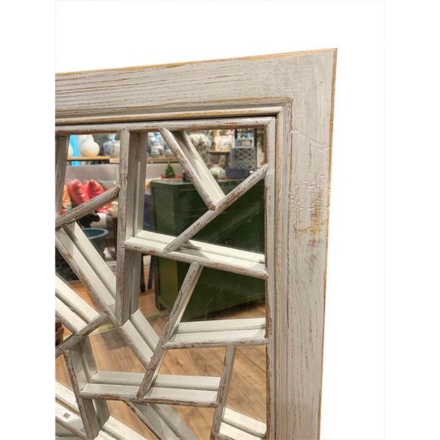 Asian Ice Crack Panel Mirror is made out of elm wood. All Hand made panel. It can be hang vertical or horizontal....