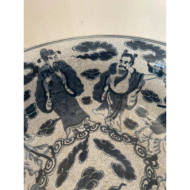 Antique Chinese eight immortals blue & white crackled glass, handpainted ceramic bowl. This is a very unique antique. Each...