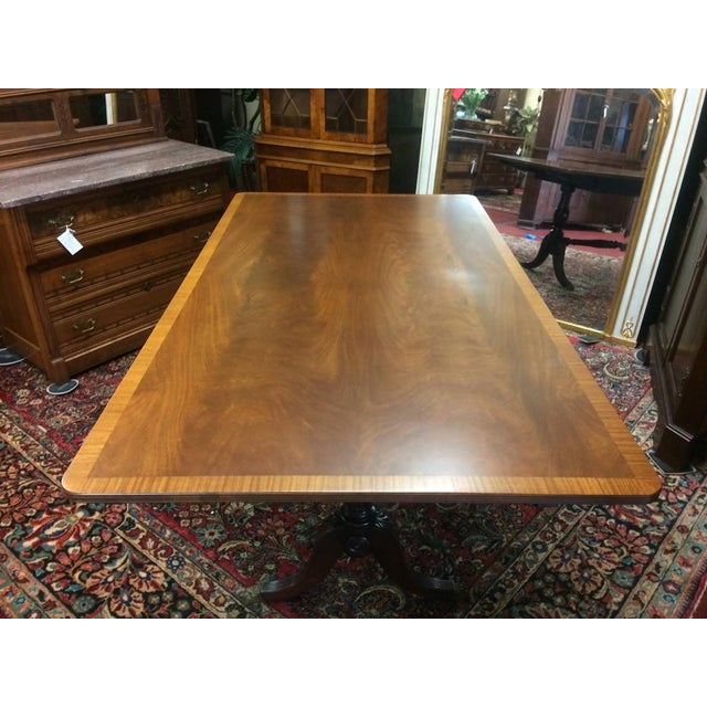 Item: Vintage Dining Table with Banded Mahogany Top (unmarked). Age & Condition: Circa 1990. Good, with some faint...