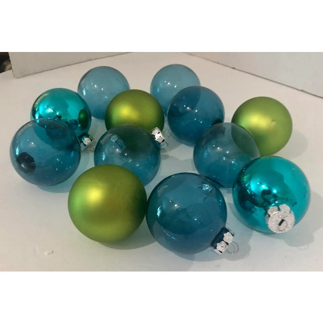 Purchased in a Miami Beach Mansion Estate Sale this Set of 12 Christmas Decoration assortment balls. Most of them are...