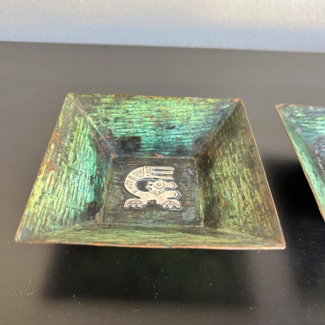 For your consideration, a 1960s Mid-Century Modern Peruvian copper and silver trinket dish. The square tray features a...