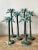 This exquisite set of six palm tree sculptures offers a sophisticated nod to timeless tropical style, perfectly capturing...