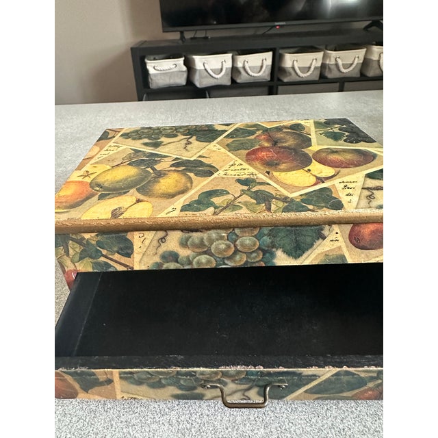This is a vintage decorative box marked 'Decoline New York', featuring a colorful fruit motif. The box has a hinged lid...