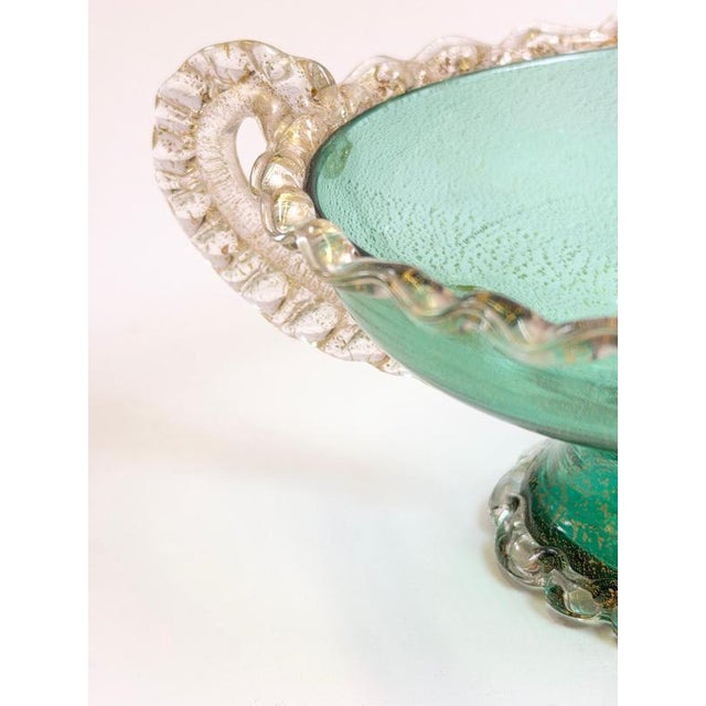 This Venetian-style Murano glass tazza was created in Italy circa 1950 and displays the decorative elegance associated...
