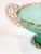 This Venetian-style Murano glass tazza was created in Italy circa 1950 and displays the decorative elegance associated...