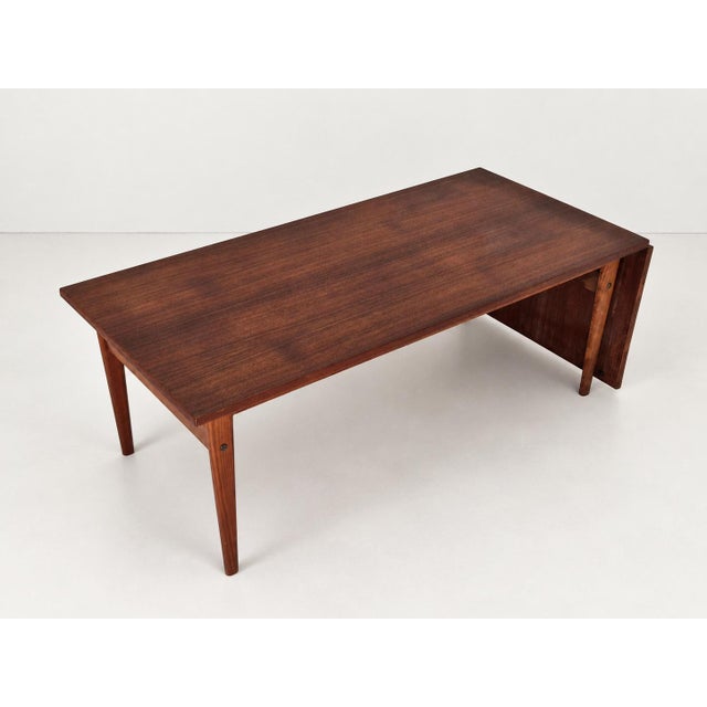 Danish Extendable Coffee Table in Teak by Grete Jalk for Poul Jeppesens Møbelfabrik, 1960s, in Good conditions. Designed...