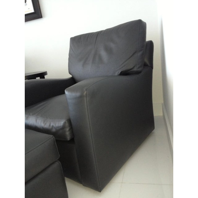 Top quality, designer sourced. A. Rudin chair and ottoman upholstered in Edelman grey leather. Made in USA. Retail price...