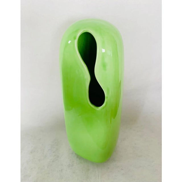 This vibrant vase was part of a collection designed by Karim Rashid for Mikasa in the early 2000s. The collection boasted...