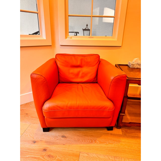 A striking pair of authentic Roche Bobois leather armchairs, showcasing the brand’s renowned balance of comfort,...