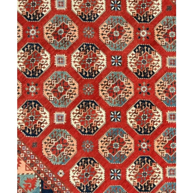 A beautiful hand knotted Kazak design rug, made of 75 % wool and 25% cotton. The wool used is soft and the pile is tight...