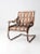 This is a 1950s vintage patio bouncer chair featuring a classic metal lawn chair design with a traditional bouncer frame...