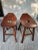 Pair of Vintage Studio Crafted Mission Style Saddle Stools. Pair of hand crafted Mission style stools in a dark mahogany...