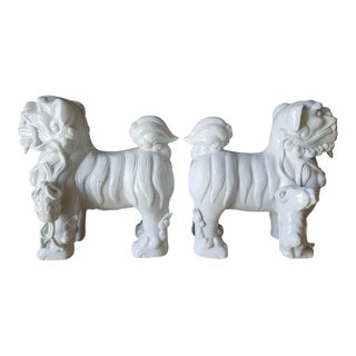 Mid-Century Japanese Blanc De Chine Porcelain Standing Foo Dogs - A Pair For Sale