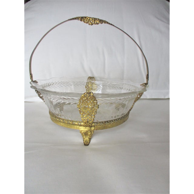 This is a Gorgeous Antique Brides Basket in a Gold Ornate Metal Frame with a Crystal Star Bust Pattern Bowl. The Basket...