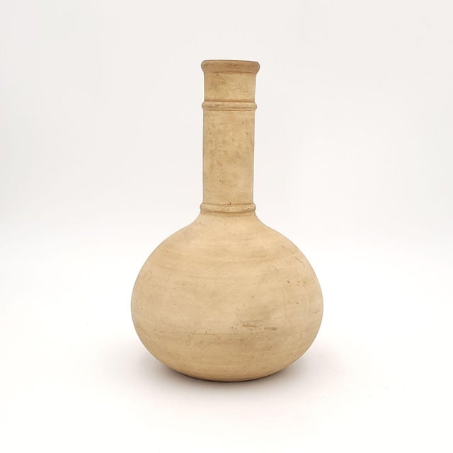 An Iznik wine bottle, Turkey, 16th/17th century. Formerly thought of a cane ware now thought of as unglazed Iznik pottery,...