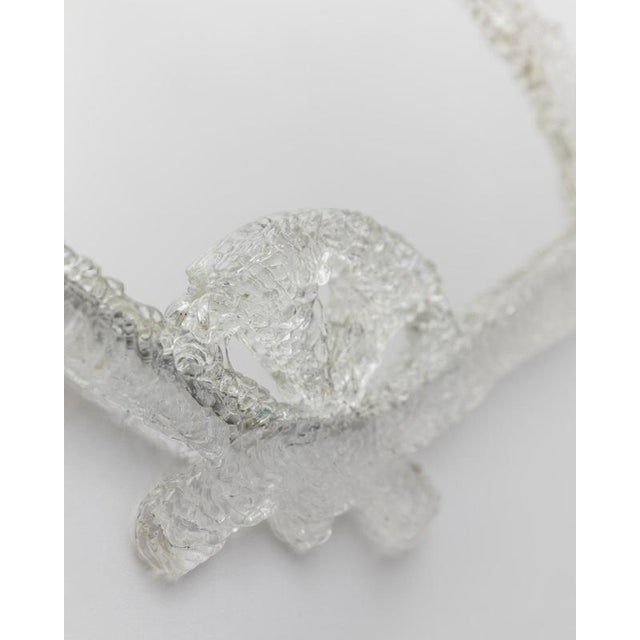 This vintage Bakelite wall mirror from the 1970s by Poliestal, Espana features a striking clear fan-shaped design with a...