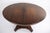 Dining table in Empire style from the 1820s, crafted in mahogany as a classic pedestal table with a rectangular top. A...