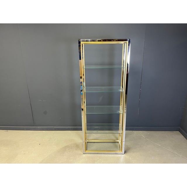 Brass, Glass, and Chrome Shelf from Renato Zevi, 1970s, in Very Good conditions. Designed 1970 to 1979 This piece is...