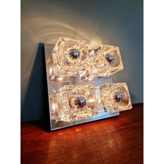 Large square ceiling/wall light in chrome-plated metal and ice cube glass, produced by the german manufacturer peill &...