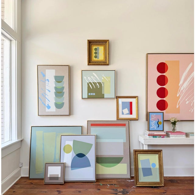 This geometric painting features clean lines and a balanced composition. Bold colors and lines pair beautifully in the...