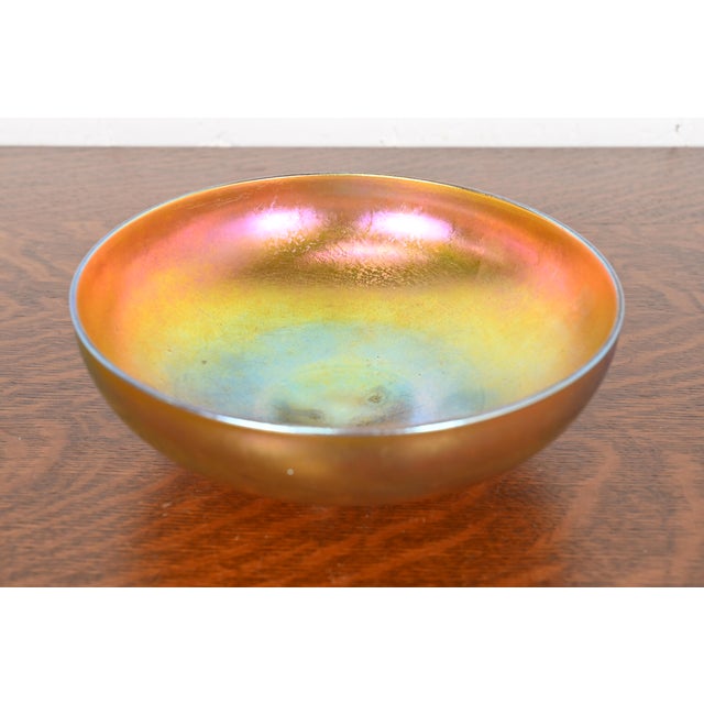 A gorgeous Arts & Crafts or Art Nouveau period aurene iridescent art glass fruit bowl or center bowl By Steuben Glass USA,...