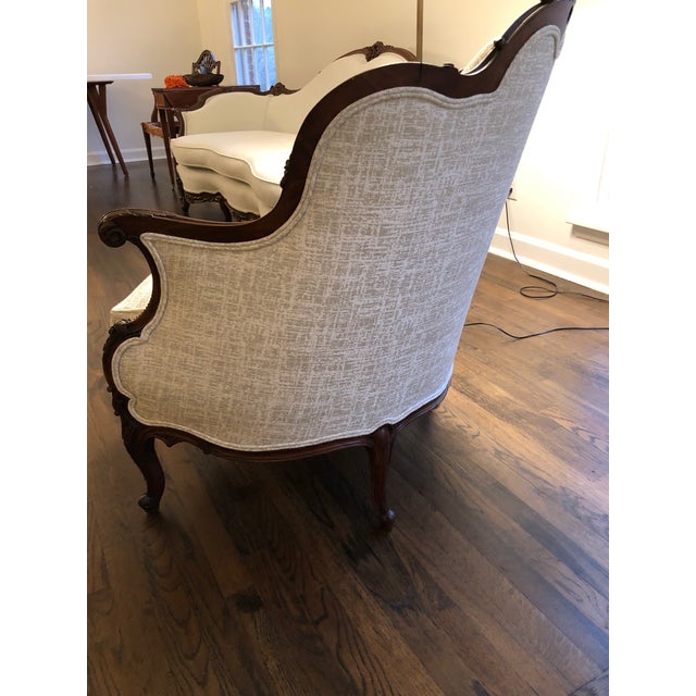 Victorian Louis XV style mahogany bergere. Raised on cabriole legs ending in scroll feet with carved floral motifs - late...