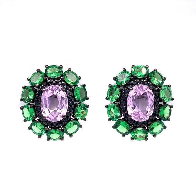 Elevate your jewelry collection with these exquisite statement earrings, crafted in luxurious 18K gold with black rhodium...