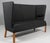 Frits Hennignsen two seater Coupe sofa with fabric and leather tubings. Frame of oak. Model FH436, made by Carl hansen....