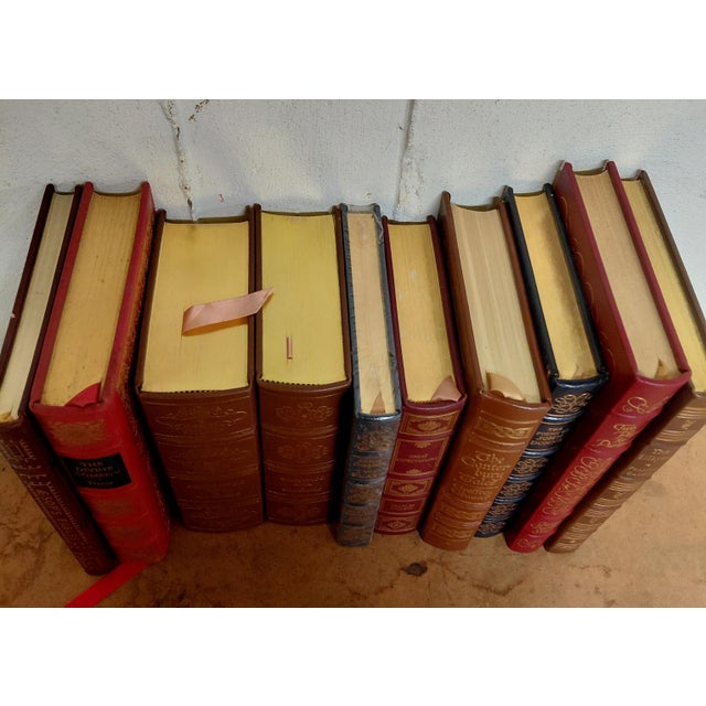 Easton Press 100 Leather Bound Set of 10. Leather covered books 5 containing collector plates one unopened. Good condition...