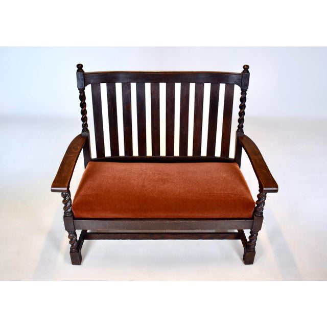 An early 20th C. antique Oak Settee bench attributed to Stickley Brothers with rich dark patina, open vertical slatted...