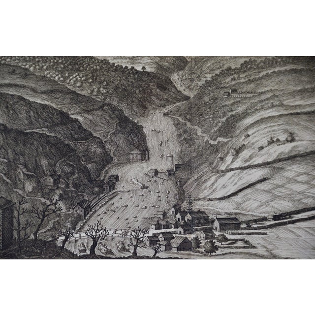 This is an antique engraved view entitled "Delineatio Cataractae" (Waterfalls in Smoland), Sweden in 1705 from "Sueciae...