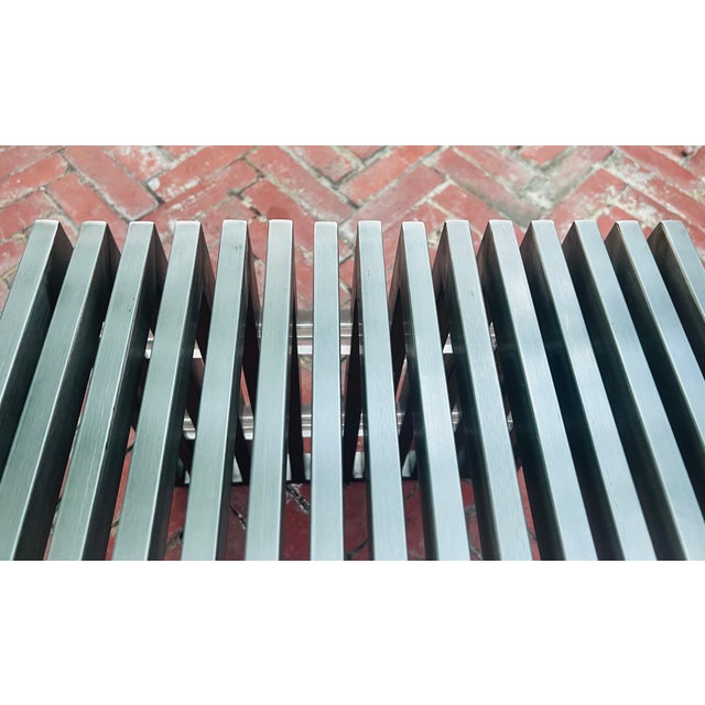 A masterclass in restraint and proportion, this architectural stainless steel bench speaks directly to the Design Within...